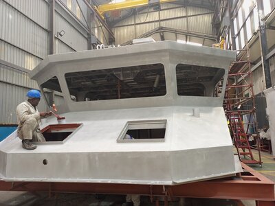 Zamde projects worker coating a vessel